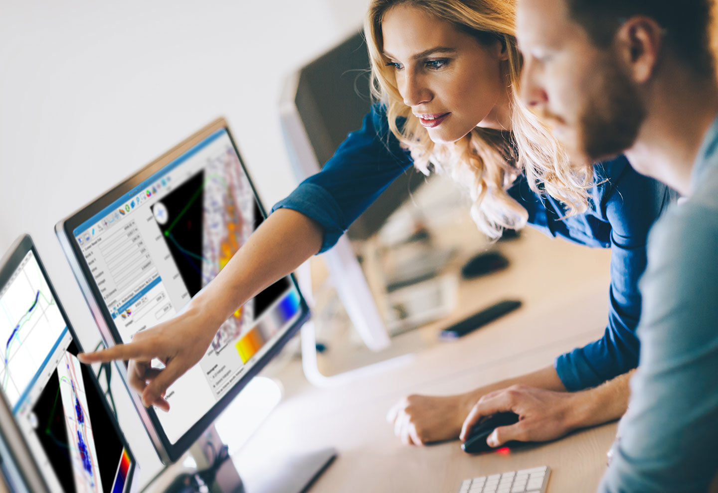 Geophysical experts in a meeting reviewing seismic visualization – Sharp Reflections